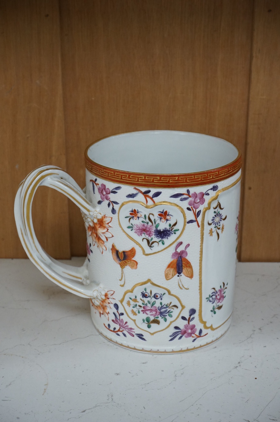 A Samson, Paris mug in Chinese export style and a Copeland Spode toby jug, Samson mug 14.5cm high.